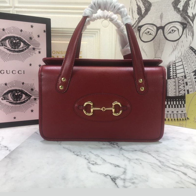 G*u*i top handle bags